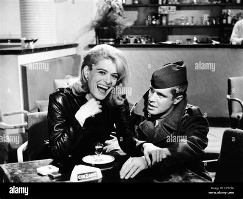 THE VICTORS, from left: Melina Mercouri, George Peppard, 1963 Stock ...