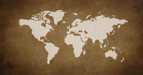 World map on a brown textured background, travel and tourism concept ...