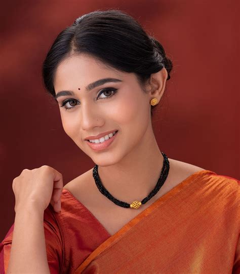 Buy Black Beads Gold Necklace with Radiant Pendant – P. N. Gadgil ...