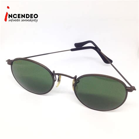 Ray-Ban W1576 Classic Collection Antique Bronze Sunglasses feature ...