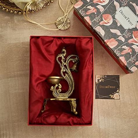 Buy DecorTwist Brass Diya for Pooja Peacock Bell Diya with Gift Box in ...