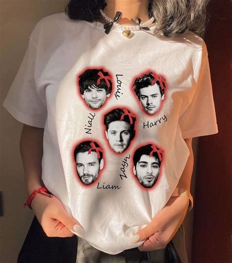 Pin by Lexie Moren on Playeras in 2025 | One direction t shirts, Cross ...
