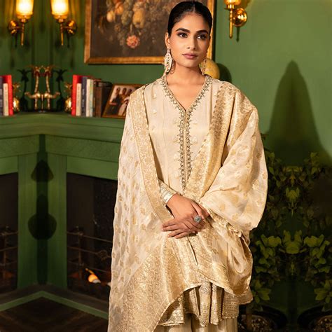 Ivory And Golden Embellished Traditional Suit – Suvidha Fashion