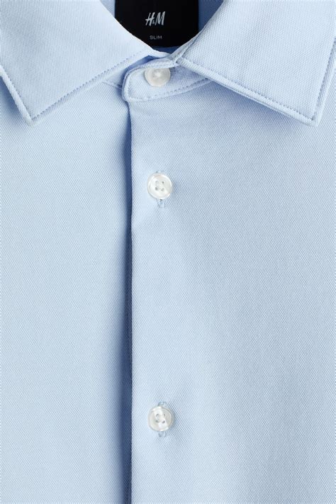 Four-Way Stretch Slim Fit Shirt - Light blue - Men | H&M IN