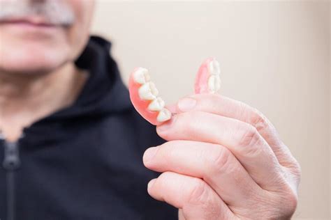 Living with Dentures: Tips for Comfort and Confidence, by Dr Mohit ...
