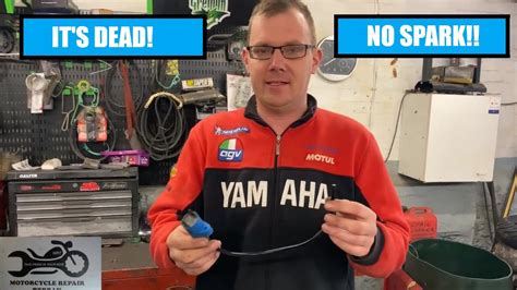 how to fix no spark on a snowmobile