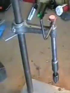 Image result for Homemade Tapping Machine