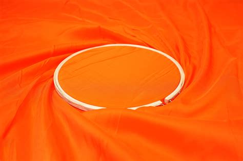 Neon orange coloured upada silk fabric