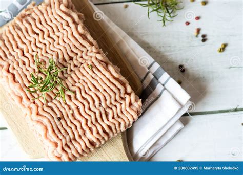 Raw Ground Turkey with Rosemary and Spices. Wooden on a White Background. Stock Image - Image of ...