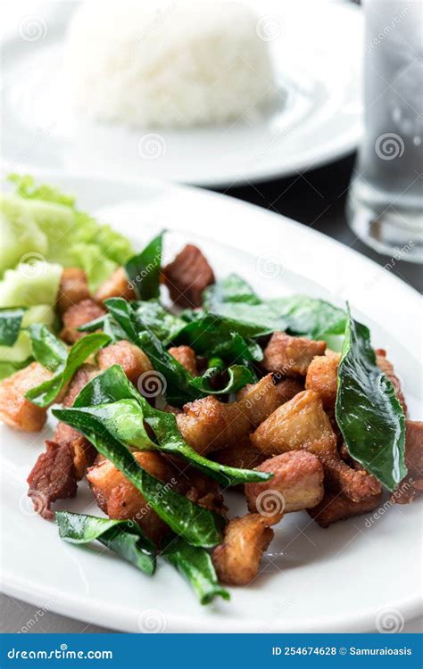 Deep Fried Pork with Leech Lime Leaf and Chili Sauce Stock Photo ...