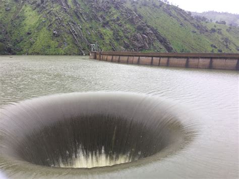 Lake Berryessa flows steadily into Glory Hole spillway