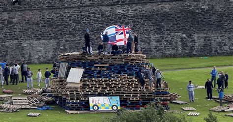 Petrol bombs fired at police at Derry bonfire site – The Irish Times