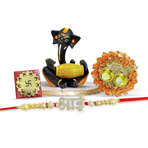Buy Xtore Rakhi with Ganesha Idol Combo Set | Ganesha Idol Figurine | 1 ...