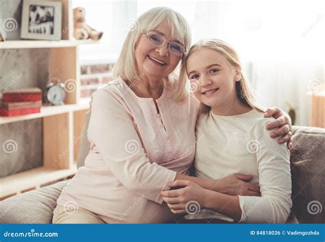 Granny and granddaughter stock photo. Image of hair, face - 84818036