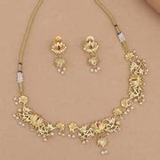 Apsara Faux Pearls Adorned Brass Lotus Motifs Gold Plated Jewellery Se ...
