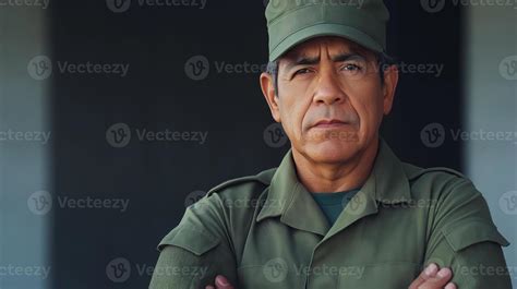 Mature Military Veteran in Uniform, Arms Crossed, Portrays Strength and ...