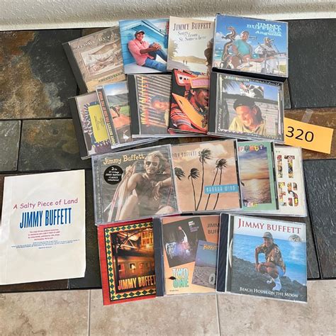 Jimmy Buffett CDs lot | EstateSales.org