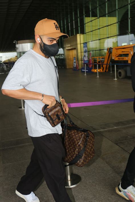Virat Kohli’s Basic Airport Look Features An LV Wallet Bag Worth A ...