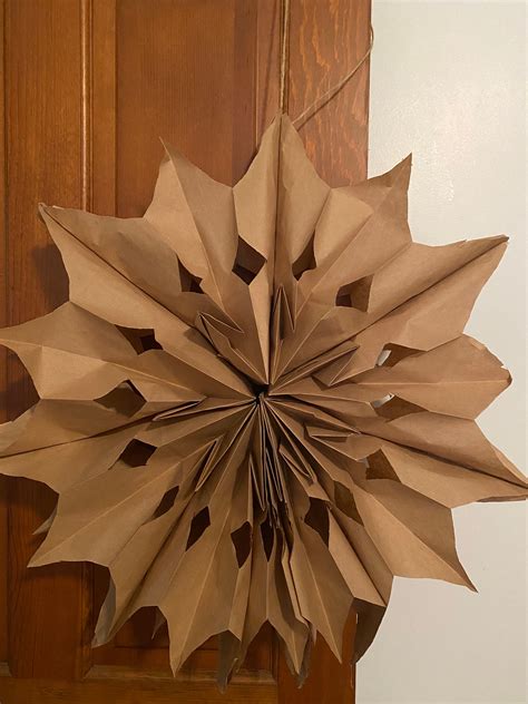 Image result for Snowflake Paper Cut