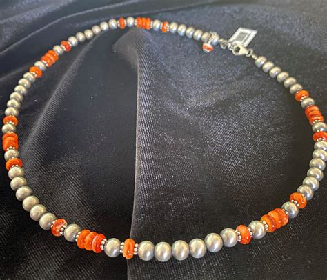 Rhodochrosite and sterling silver bracelet — Bowlin Travel Centers, Inc.