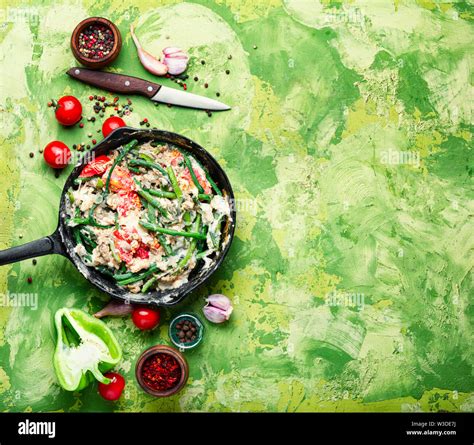 Protein scrambled eggs with asparagus beans. Fried eggs with vegetables ...