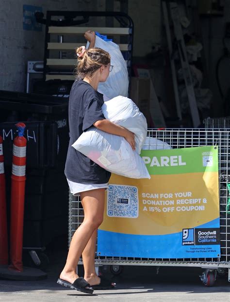 NATASHA BURE Dropping off Clothes at Goodwill in Santa Monica 07/29 ...