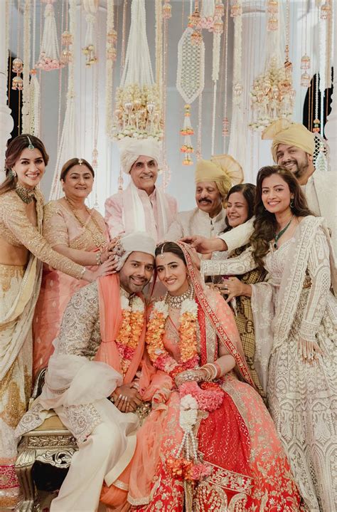 Bride: Nupur Sanon & Groom Stebin Ben in our Bespoke Ensemble – Manish ...