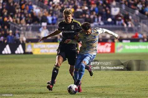 Philip Quinton of Columbus Crew and Julián Carranza of Philadelphia ...