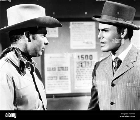 POSSE FROM HELL, from left, Audie Murphy, John Saxon, 1961 Stock Photo ...