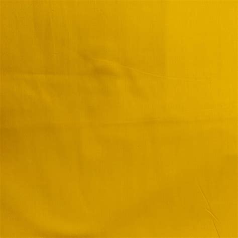 Buy Haldi Yellow Solid Cotton Satin Fabric Online – TradeUNO Fabrics