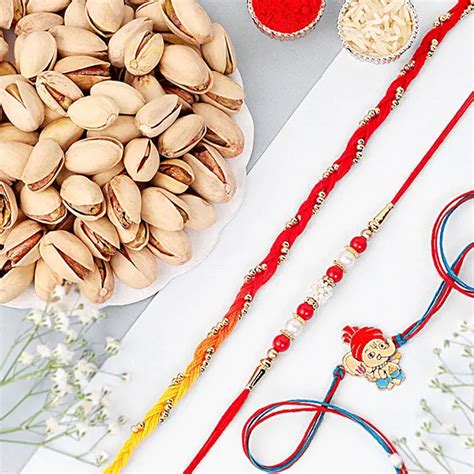 Send Radiant Rakhi Trio Hamper Online | Rakhibazaar.com