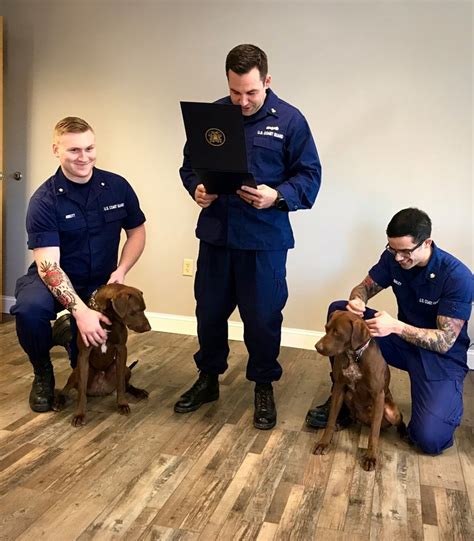 Marquette’s Coast Guard dogs advance ranks, honored in sweet ceremony ...