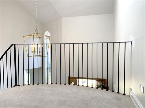 Minimalist wrought iron railings painted satin black in Barrington ...