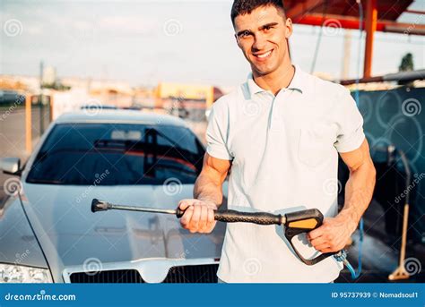 Man with High Pressure Washer on Car Wash Station Stock Image - Image of dirty, garage: 95737939