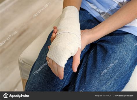 Pictures: bandage hand | Girl with bandage on her hand — Stock Photo © belchonock #145707821