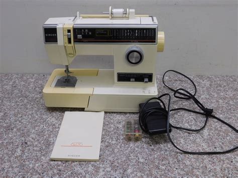 Image result for Singer Sewing Machine Model 6235 Manual