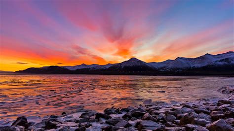 Download wallpaper 2560x1440 mountains, rocks, stones, sunset, sea ...