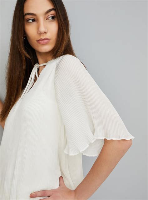 Buy Women Accordion Pleated Tie-Up Top Online at just Rs. 799.0 ...