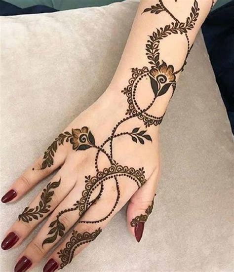 बैकहैंड पर लगाएं बेल मेहंदी के ये डिजाइंस | bel mehndi designs for back ...