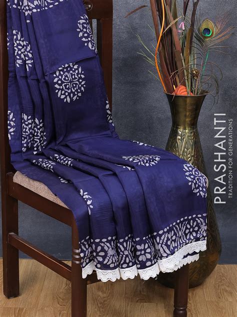 Organza saree blue with allover batik prints and crocia lace work bord ...