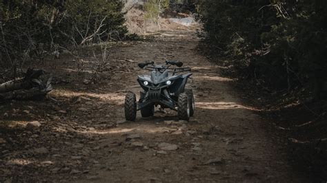 Download wallpaper 1366x768 atv, wheels, extreme, road, forest tablet ...