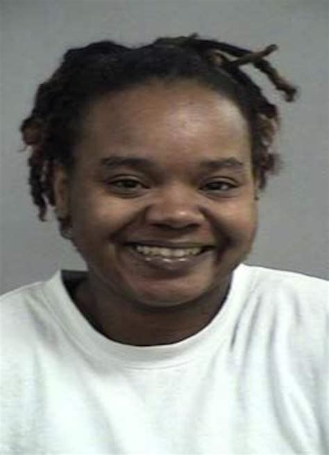 Woman charged in connection to fire that killed dog