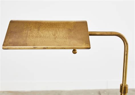 Pair of Patinated Brass Adjustable Pharmacy Floor Lamps at 1stDibs