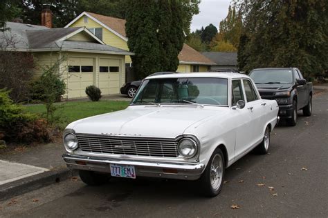 OLD PARKED CARS.: 1965 Chevy II Nova.
