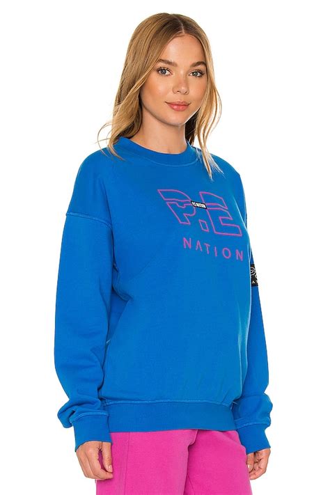 P.E Nation Heads Up Sweatshirt in Blue Bright | REVOLVE