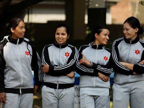 Female soldiers at army barracks - Nepali women soldiers break glass ...