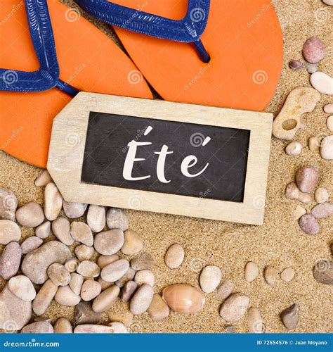 Flip-flops on the Sand and Word Ete, Summer in French Stock Photo ...