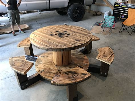 Spool table with seats | Wooden spool shooting bench, Spool bench ideas ...