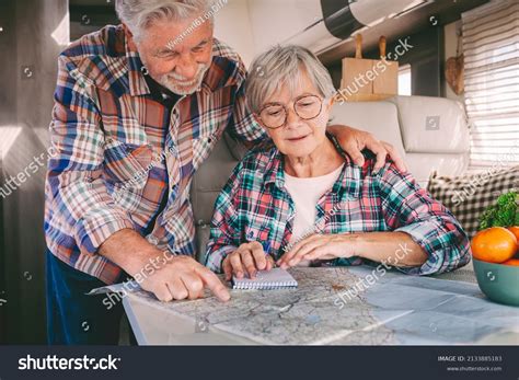 Senior Man Woman Examining Guide Map Stock Photo 2133885183 | Shutterstock