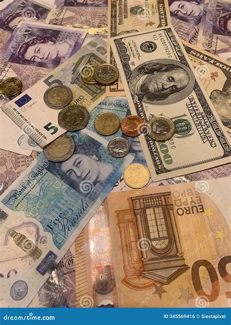 Assorted Global Currency Notes and Coins Displayed Together Stock Photo ...